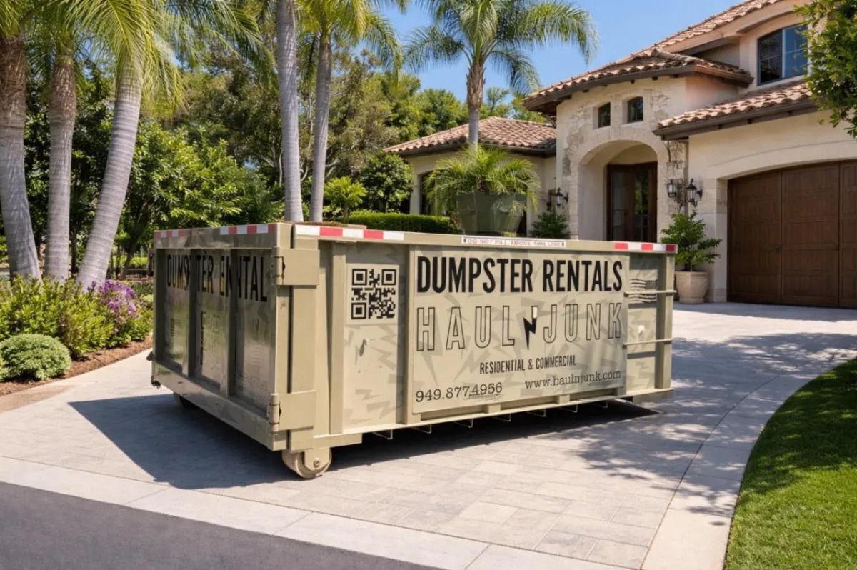 12 yard HaulNJunk dumpster in a residential driveway